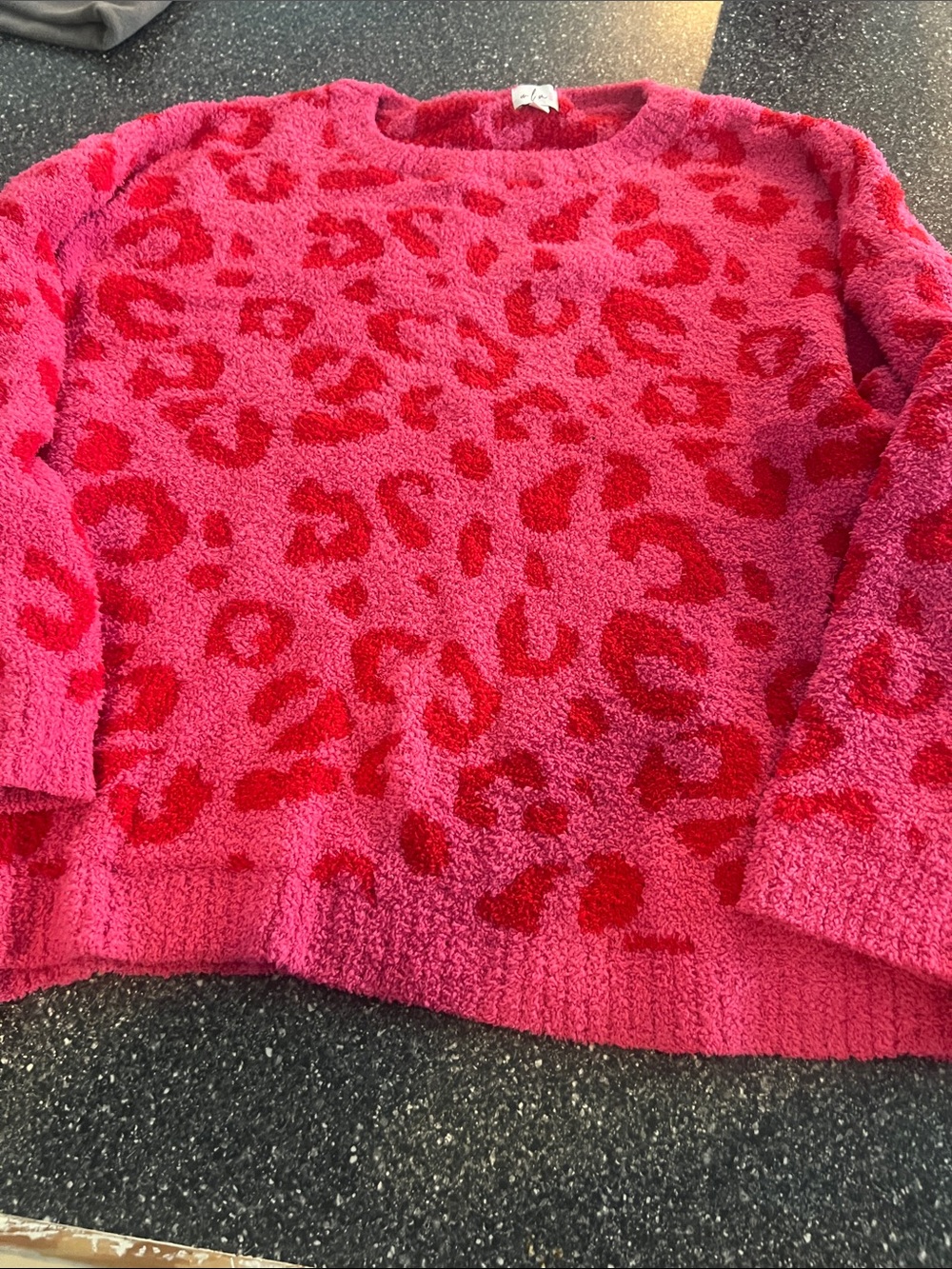 Plush Pink Crewneck Sweater with Red Leopard Print- boutique bought. Never worn